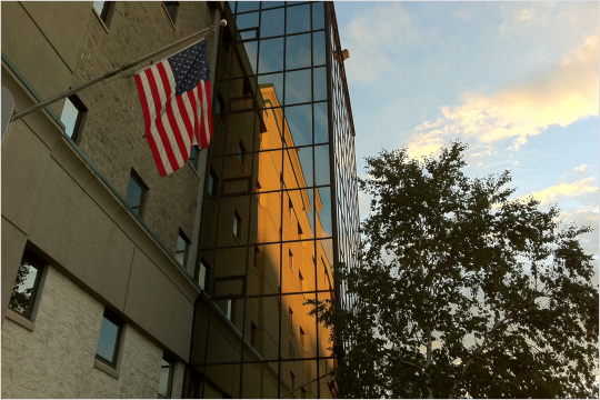 USA flag in front of company headquarters