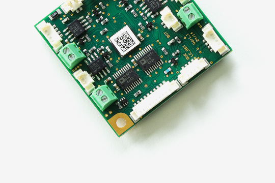 Board camera in green with a QR code in the center.