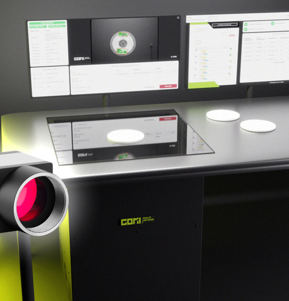 COMI Label Reader as a desktop scanner, with three yellow light bars on the left and an uEye camera in front