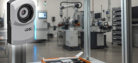 uEye XC next to an illuminated inspection station with a tool tray to be tested