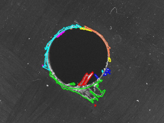 Inspection of drill holes and machined edges in fiber-plastic composites