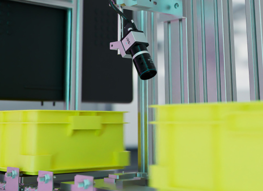 A uEye Live Monitoring camera monitors a conveyor belt.