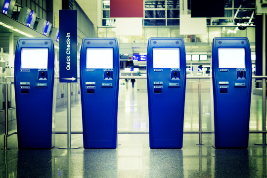 Four quick check-in terminals in one airport hall