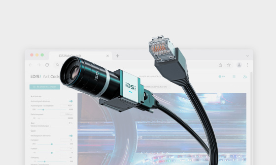 Industrial monitoring camera uEye SCP in front of a screenshot