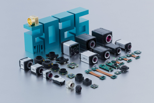 IDS cameras lined up in front of the 3D number 2026 with a golden camera on the number 2