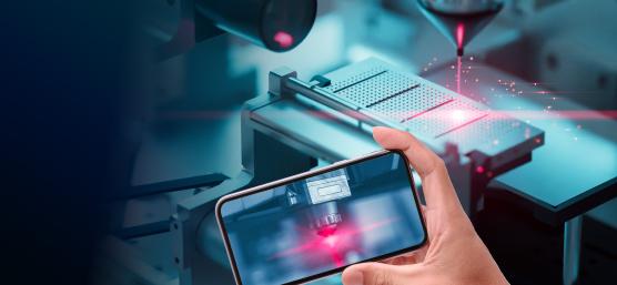 Smartphone displays laser cutting process monitored by IDS camera.