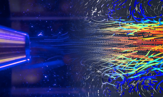 Flow visualization with color-coded particle tracks from event-based camera analysis on a jet stream