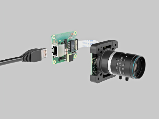 Modular industrial camera system with lens, sensor module, daughterboard, and Ethernet interface for flexible image processing solutions