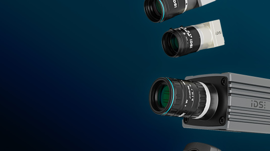 Various industrial camera models with lenses mounted on them