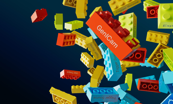 Colorful Lego bricks with lettering loose in front of dark background.