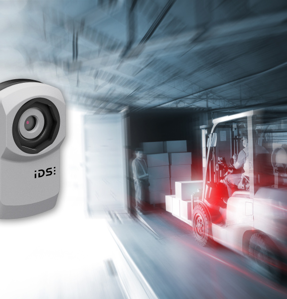 uEye XC camera hovers next to a dynamic scene with a forklift and truck.