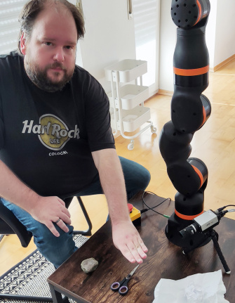 Robot for playing "Rock, Paper, Scissors"
