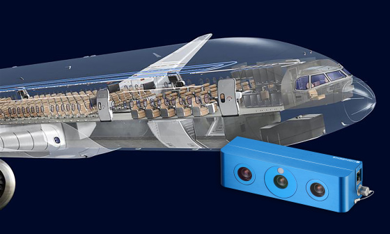 Front section of an aircraft with a view into the cabin, with an Ensenso 3D camera in the foreground.
