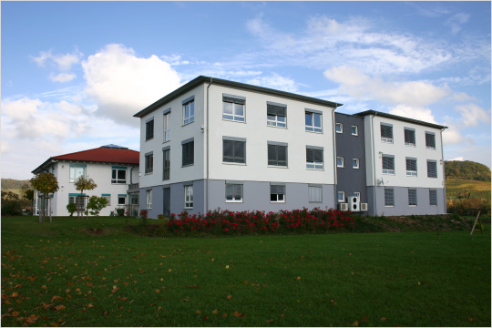 Company building including the second extension