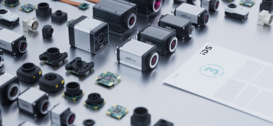 Arrangement of the entire IDS range of industrial cameras + warranty document