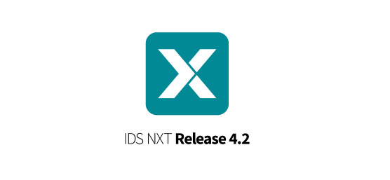 IDS NXT logo: White X on coloured IDS background, release version 4.2