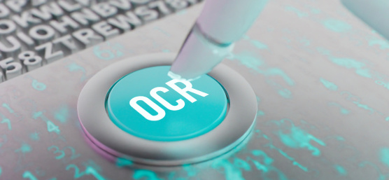 White button with the inscription “OCR”