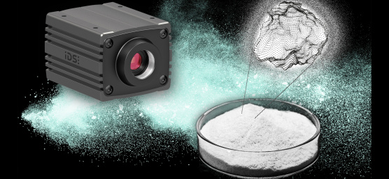 uEye Warp10 next to a Petri dish containing a very fine-grained material sample and a point cloud of a particle