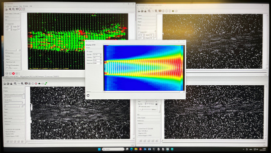 Software interface with particle images and color-coded flow analysis from event-based camera data