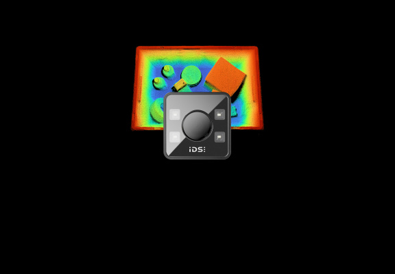 3D ToF camera in front of a color-coded depth map featuring various objects