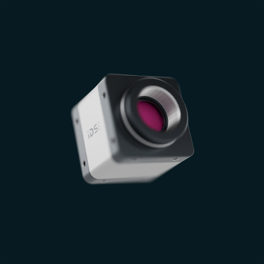 IDS camera with a violet filter glass against a dark background
