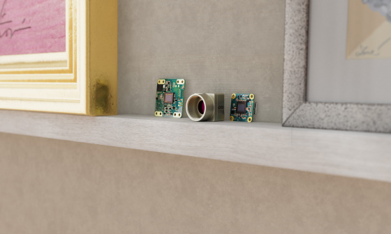 USB3 uEye XCP, XLS and GigE uEye LE cameras are positioned on a picture rail between 2 classic picture frames
