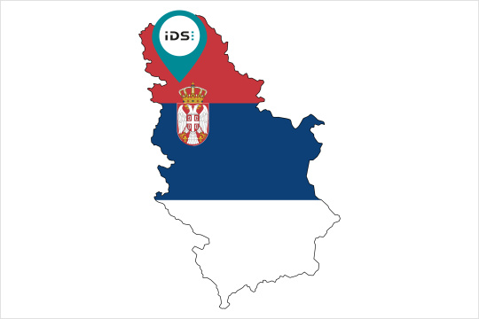 Map of Serbia in the national colors with the IDS office in Novi Sad marked