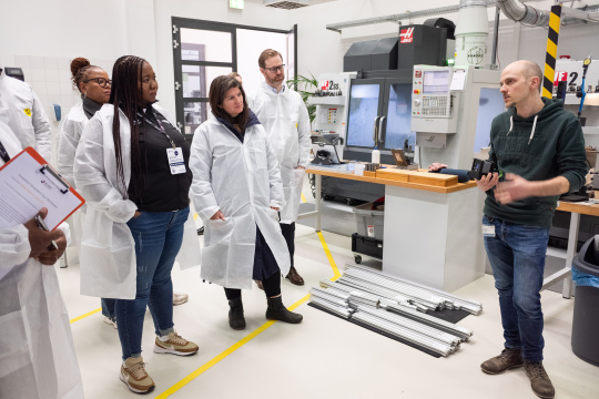 MIT REAP delegation on a tour of IDS's hardware development department