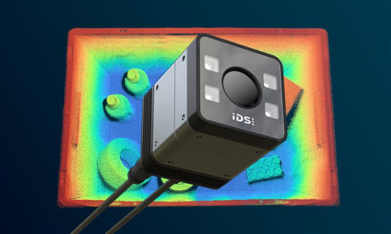 3D ToF camera in front of a colour-coded depth map featuring various objects