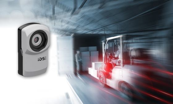 uEye XC camera hovers next to a dynamic scene with a forklift and truck.